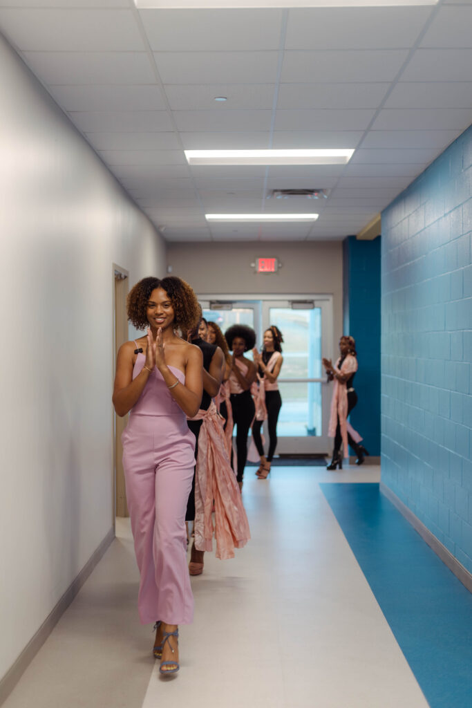 JP's Fashion Spectrum practices runway skills during a branding photo session in Grovetown, Georgia
