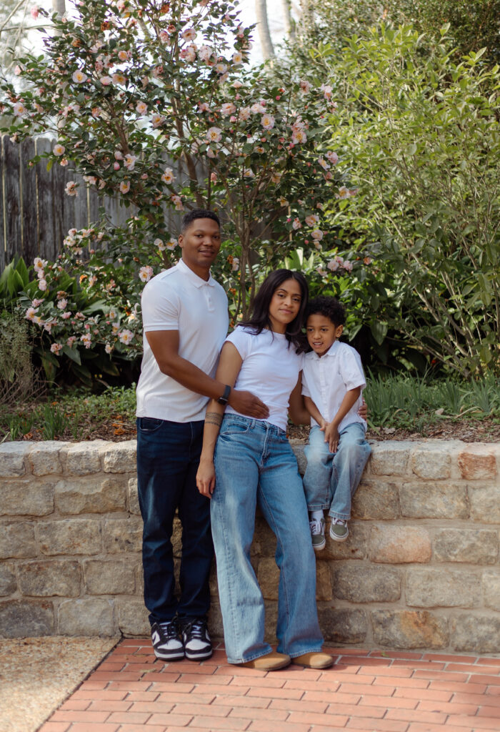 Candid family photography session at a park in Augusta, Georgia with natural light and greenery