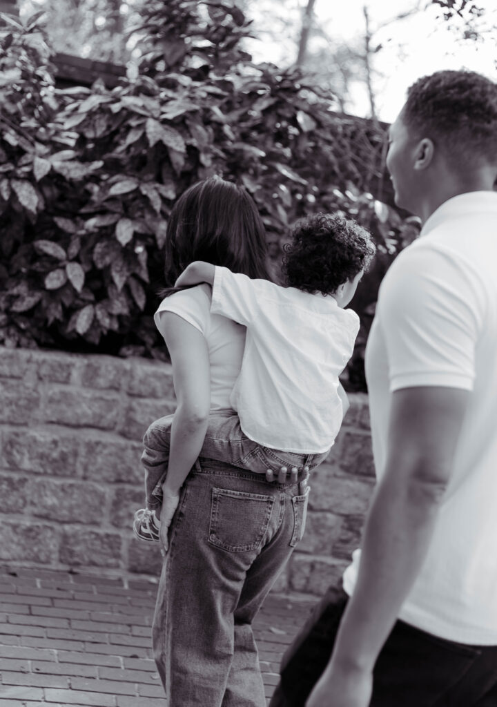 Black and white shot of family at photo session