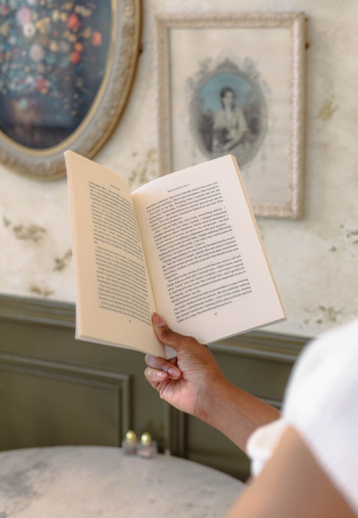 Close-up of an author's book for branding session at a coffee shop