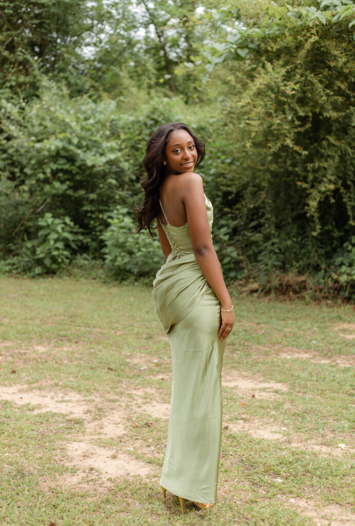 Girl posing for prom photo session