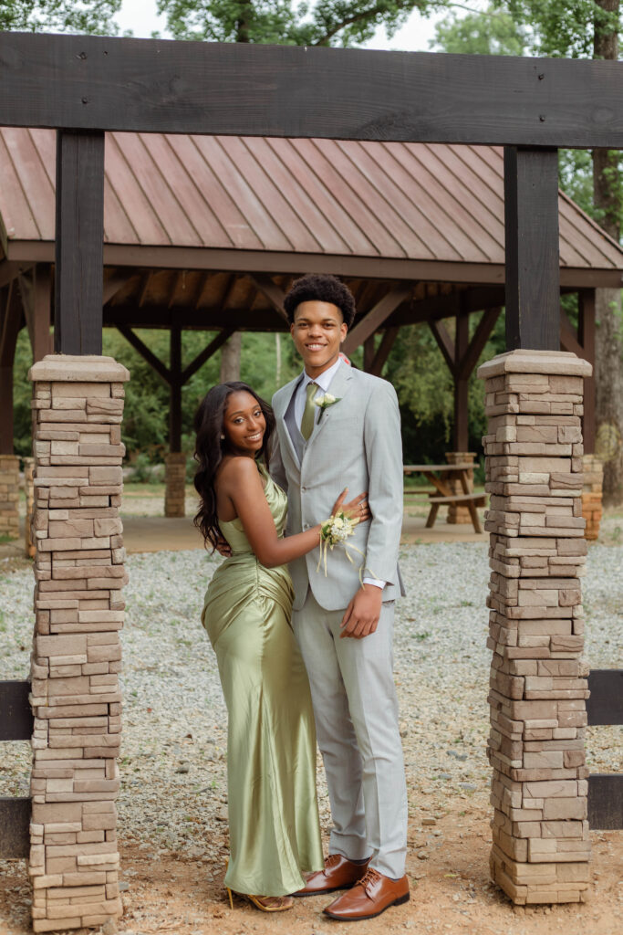 Couple hugging together for photos