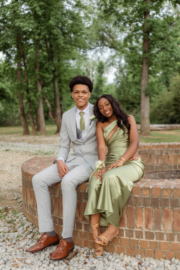 Prom couple sitting close to one another in Evans, Georgia