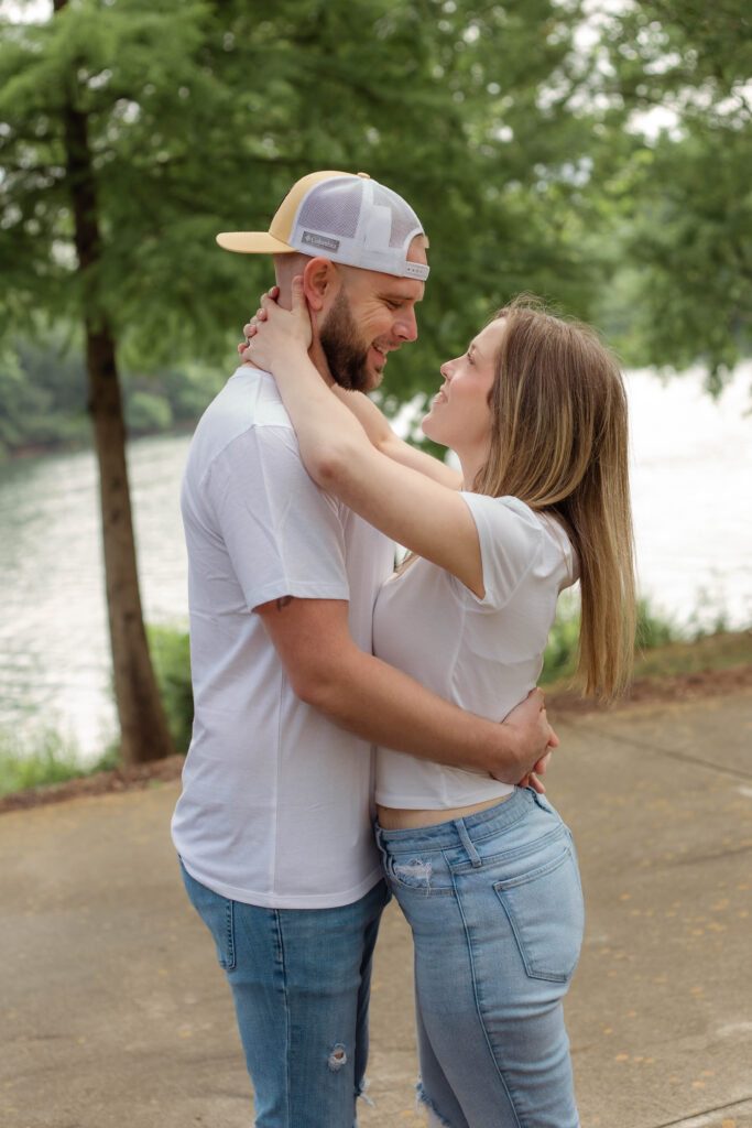 An engaged couple holding each other in North Augusta
