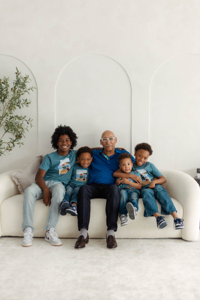 Grandparent and grandchildren posing for a group photo