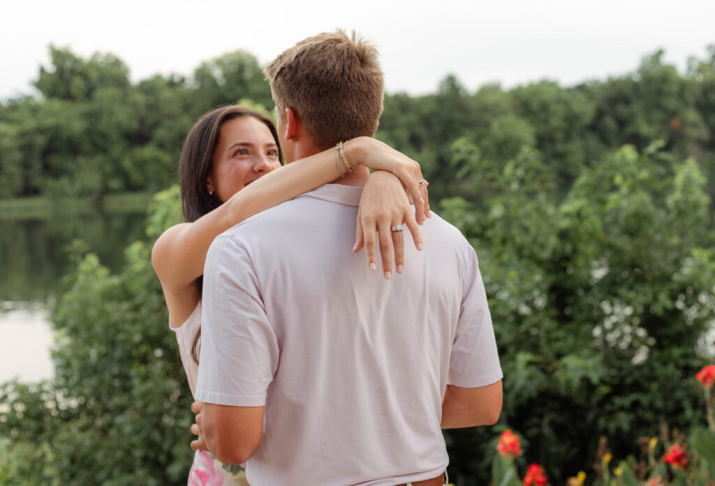 Newly engaged couple swaying for photo session