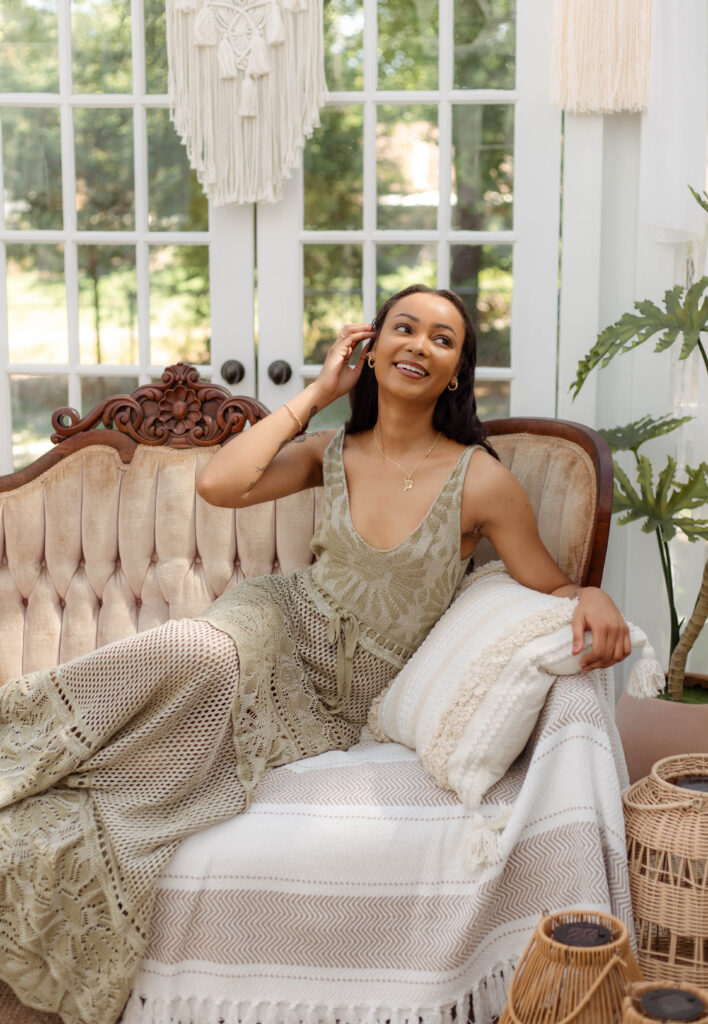 Candid portrait of a model laughing during a boho styled shoot in North Augusta, South Carolina