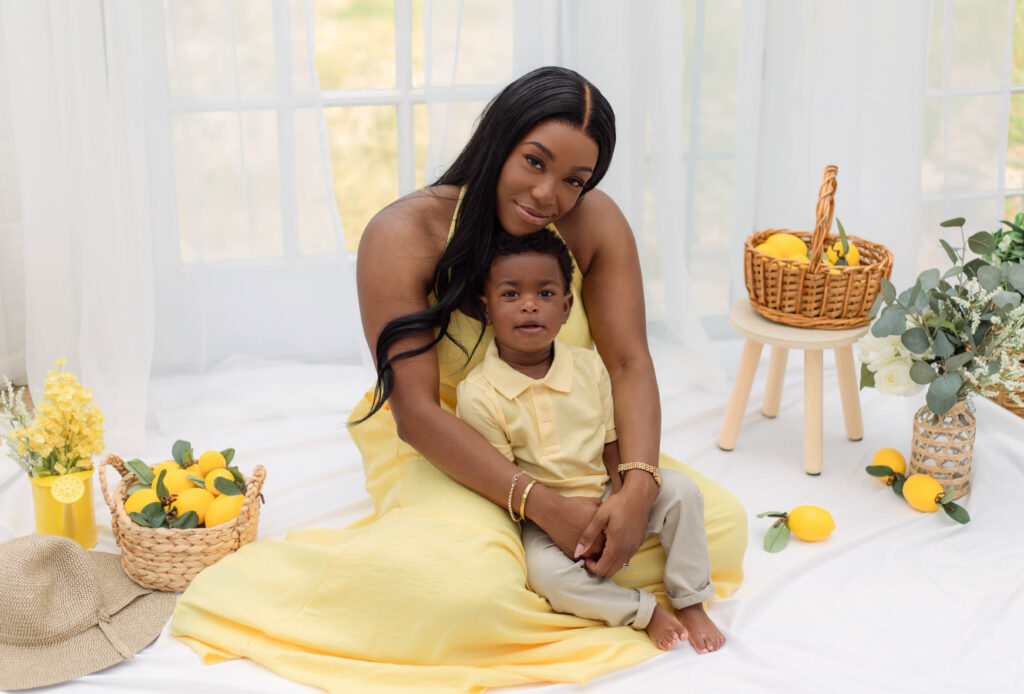 Mother and son pose for photos at The Glass Studio in North Augusta