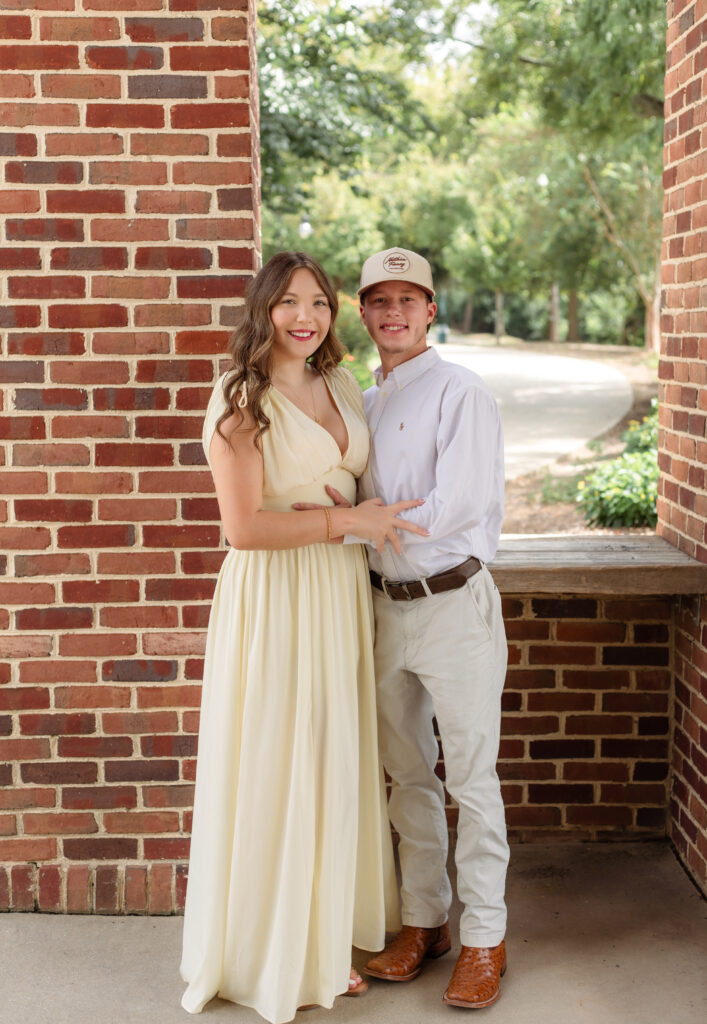 Full body shot of a recently engaged couple