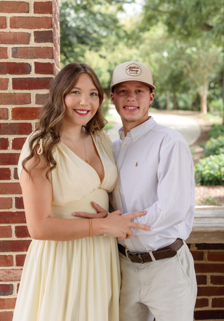 Engaged couple holding each other close for photo session